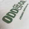 Close up of Oddflower logo puff print